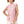 Load image into Gallery viewer, Woman wearing a pink top with white trim and white shorts on a beige background