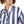 Load image into Gallery viewer, Woman wearing a blue and white striped shirt against a beige background
