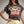Load image into Gallery viewer, Person wearing a dark gray t-shirt with 'New York City Brooklyn Sport Division' print, paired with light-colored pants.
