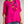 Load image into Gallery viewer, Woman wearing a bright pink top and blue jeans with a colorful necklace against a neutral background
