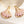 Load image into Gallery viewer, Gold and pink earrings in a jewelry box with delicate gold thread.
