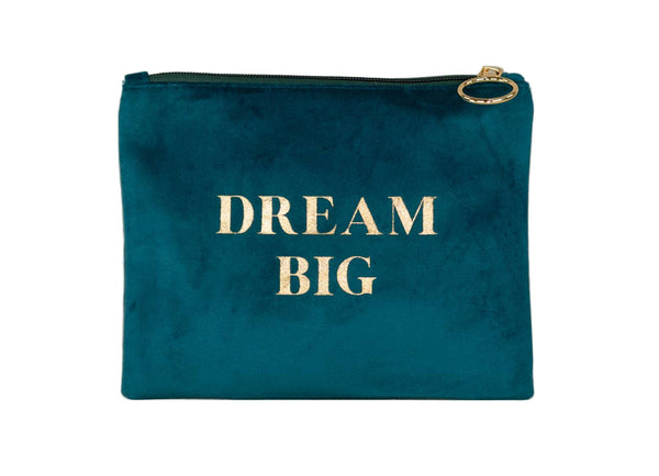 Teal pouch with 'Dream Big' text on a light wooden surface and gray background