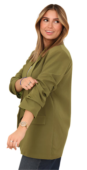Woman wearing an olive green jacket on a white background