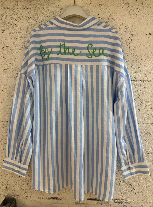 Blue and white stripe shirt with by the sea embroidered at the back