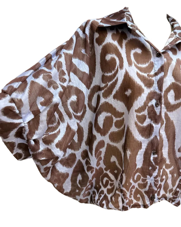 Abstract top with bat wing sleeve in brown and blue