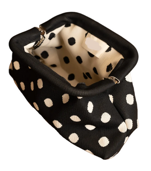 Black and white polka dot clutch bag