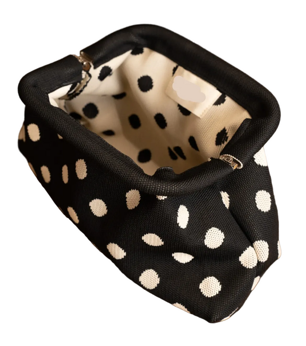 Black and white polka dot clutch bag