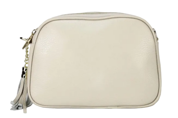 Beige handbag with a strap on a light gray background