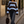 Load image into Gallery viewer, Front view of woman wearing an oversized striped knit sweater with a loose fit and high-waisted jeans.
