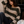 Load image into Gallery viewer, Close-up of the wide boat neck and chunky ribbed finish on a soft, striped pullover sweater
