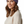 Load image into Gallery viewer, A woman wearing a textured purple twisted headband and a cream-colored knit sweater, shown from the chest up against a plain white background.
