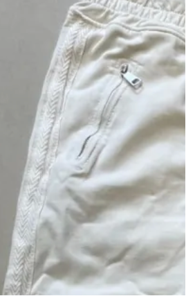 Light cream joggers with stripe detail down the side