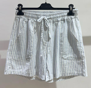 Striped shorts in pale blue and white with pockets and a drawstring