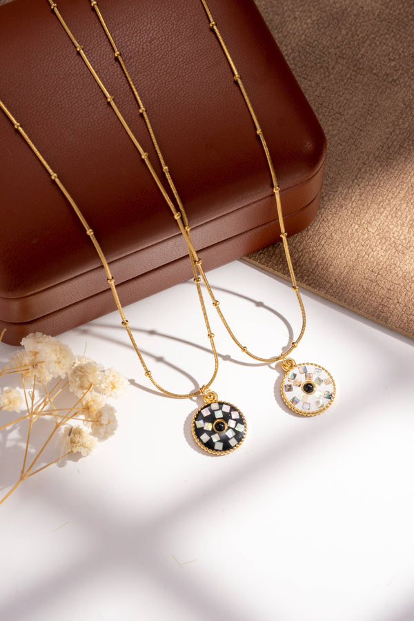 Set of 2 round mosaic necklaces in black, white and gold stainless steel