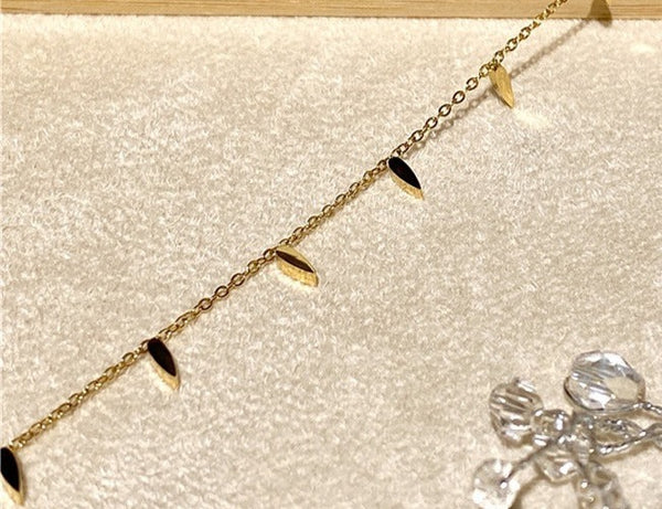 Dart pendant necklace perfect for layering chains