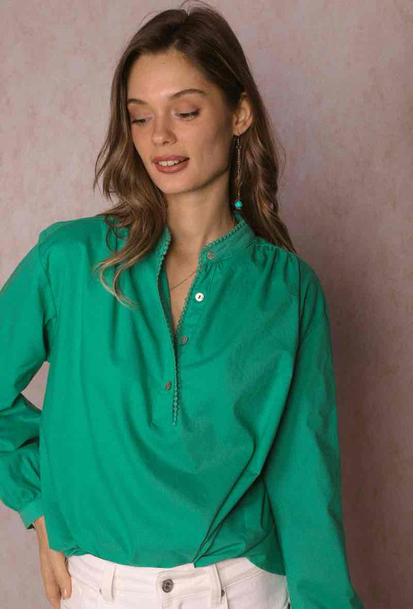 flowing green shirt