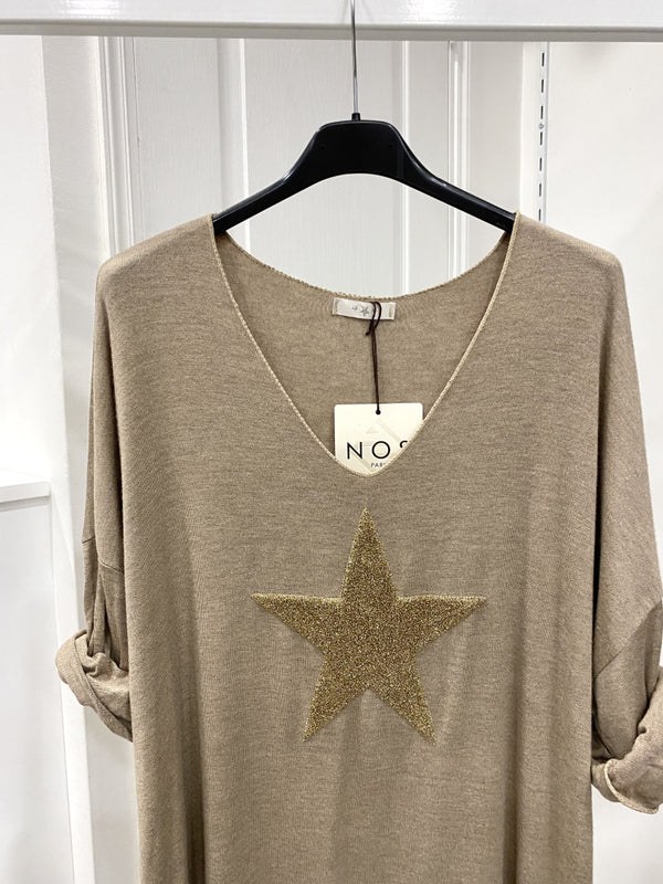 Light sweater embroidered with golden star