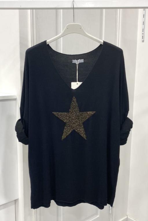 Light sweater embroidered with golden star