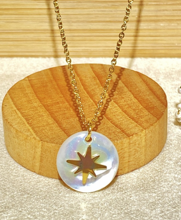 Shell disc star charm necklace