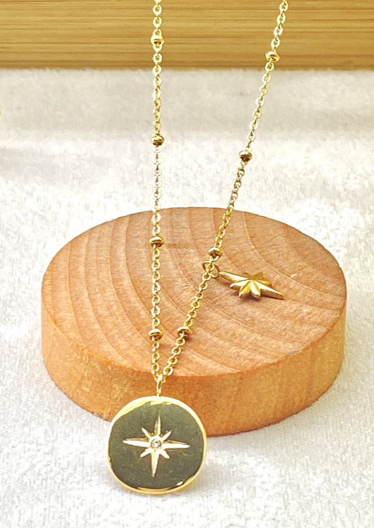 Gold star disc & charm necklace