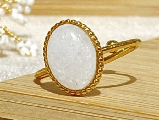 Decorative ring with white stone